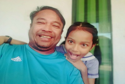 Mr Sokphen and his daughter